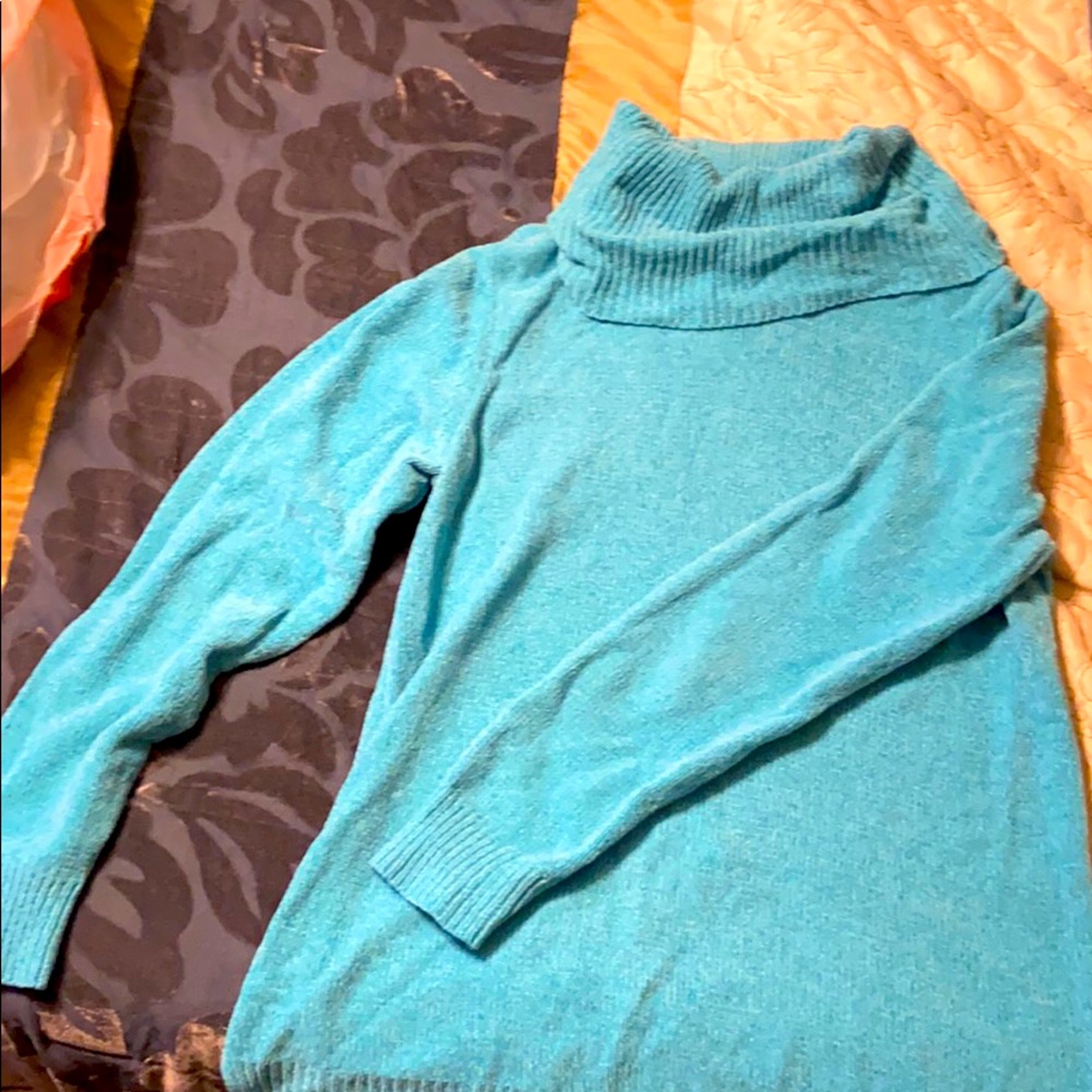 Blue rolled turtleneck sweater
